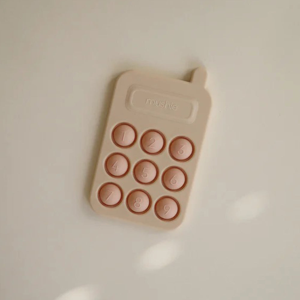 Mushie Phone Press Toy Blush